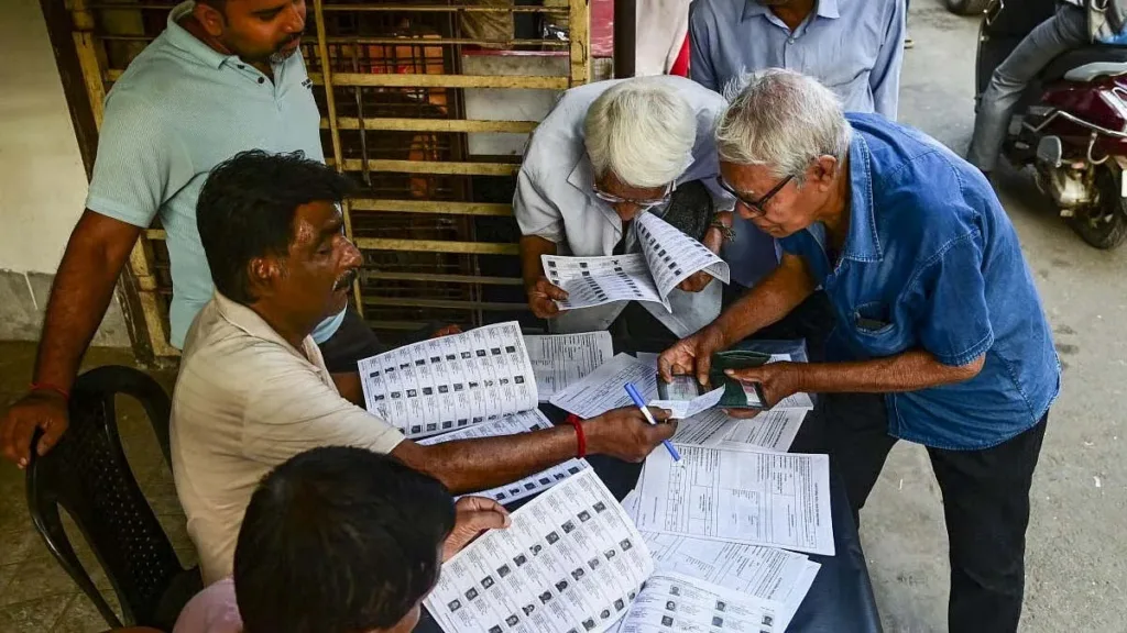 People checking their details in SIR form at West Bengal