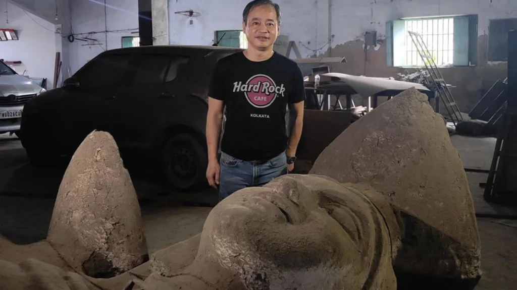 The recovered Paroma statue, broken at the base, at the former tannery of Hui Hao Howard Lee, who found the landmark.