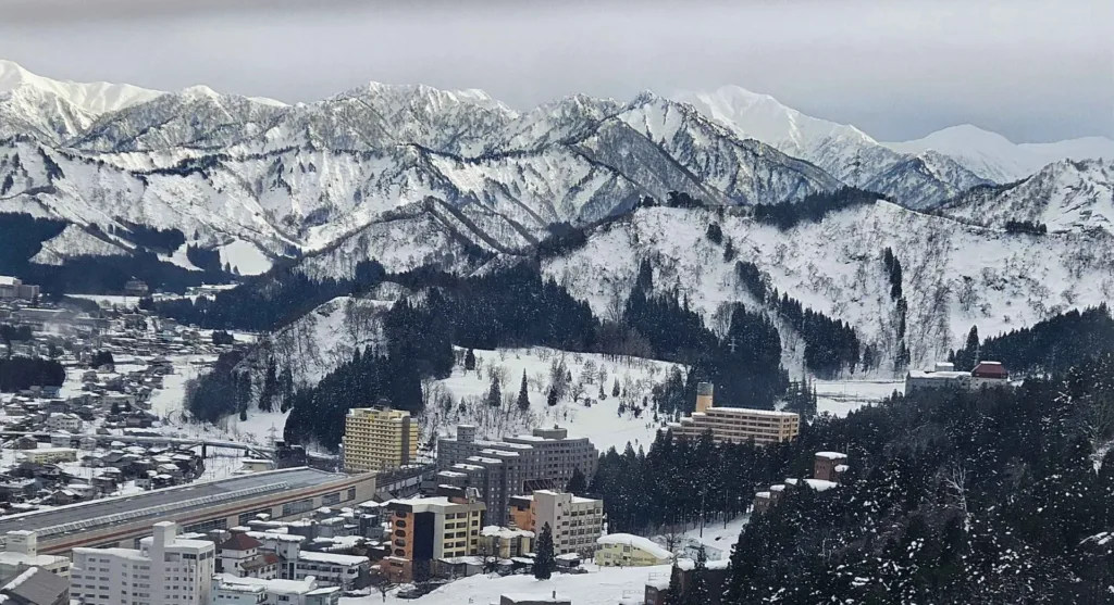 A winter landscape capturing the snowy town of Yuzawa in Niigata, Japan