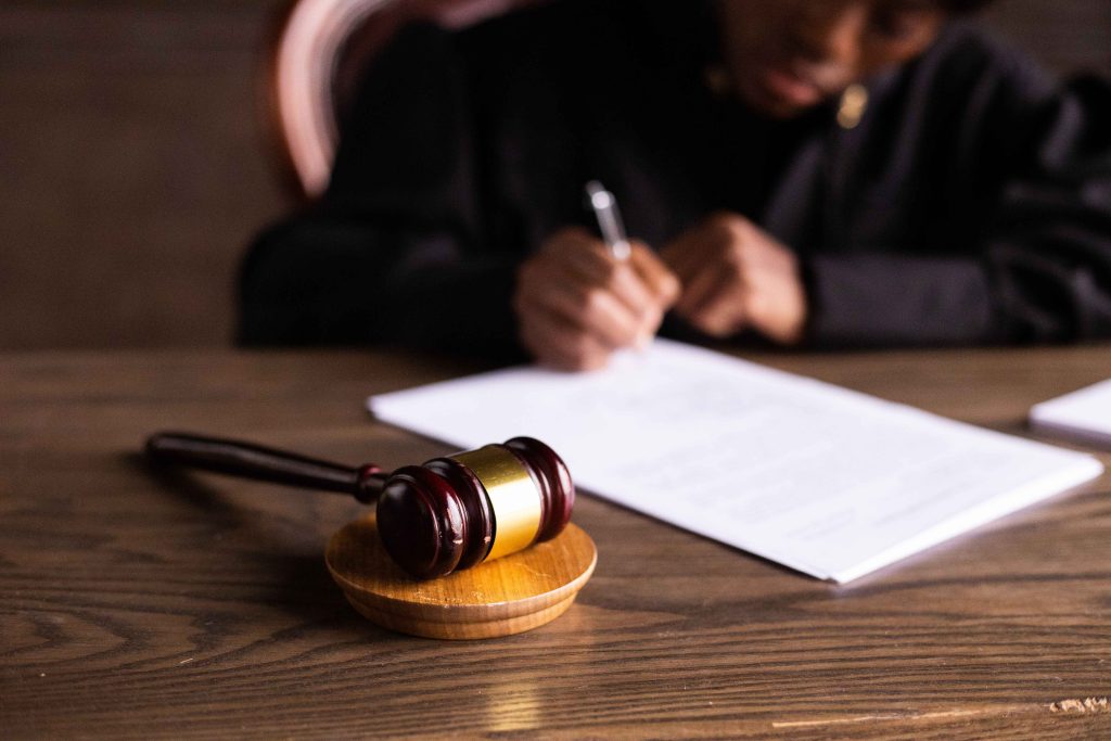 The Madhya Pradesh High Court reduced a life sentence awarded to a man convicted of killing his seven-month-pregnant wife