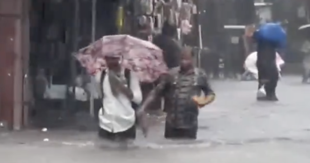 Mumbai rains trigger chaos as IMD red alert halts normal life. (ANI)