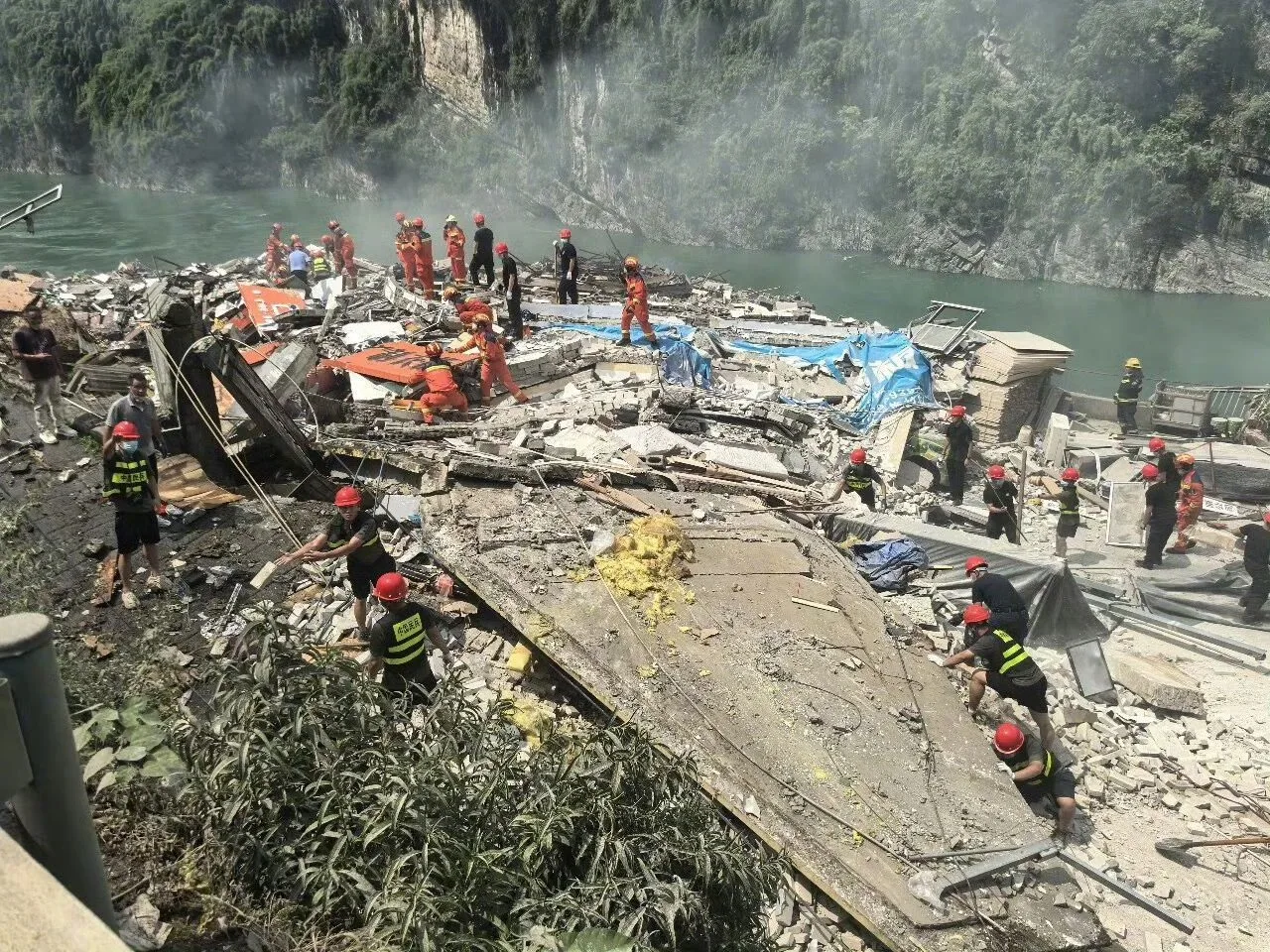 China landslide buries homes in Chongqing, kills 8 and leaves 34 missing