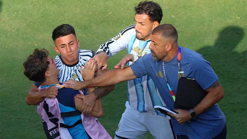 Argentina's Paredes in a tussle with Spain's Eric Garcia after the FIFA World Cup final