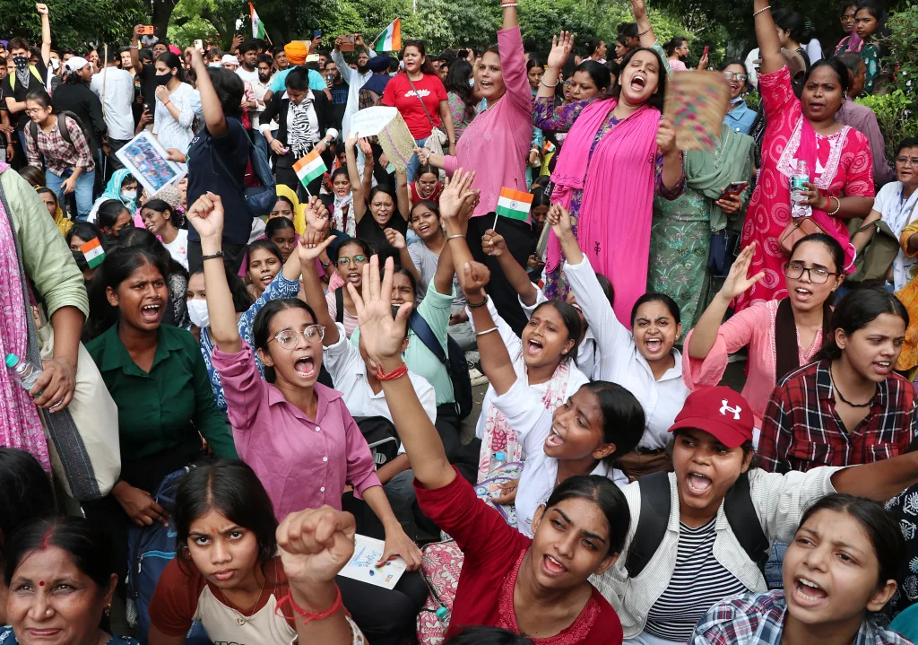 Students sit at the protest site at Jantar Mantar supporting the Cockroach Janata Party's (CJP) protest, demanding the Union Education Minister Dharmendra Pradhan's resignation over alleged examination irregularities and NEET paper leak/ ANI