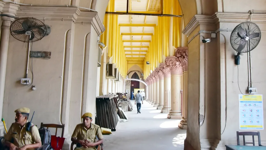 Security Personnel sits at Calcutta High court corridor as Calcutta High court (ANI Photo)
